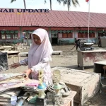 Sekolah di Aceh Mulai Bersih-bersih Pascabanjir Bandang